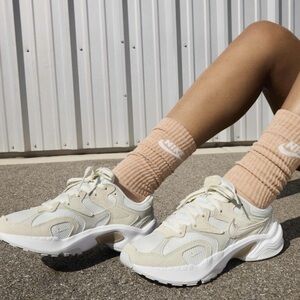 Nike Cream and White Athletic Shoes